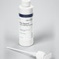 Kannaco Pro Sport 8 oz backbar bottle with cap on and the pump beside it